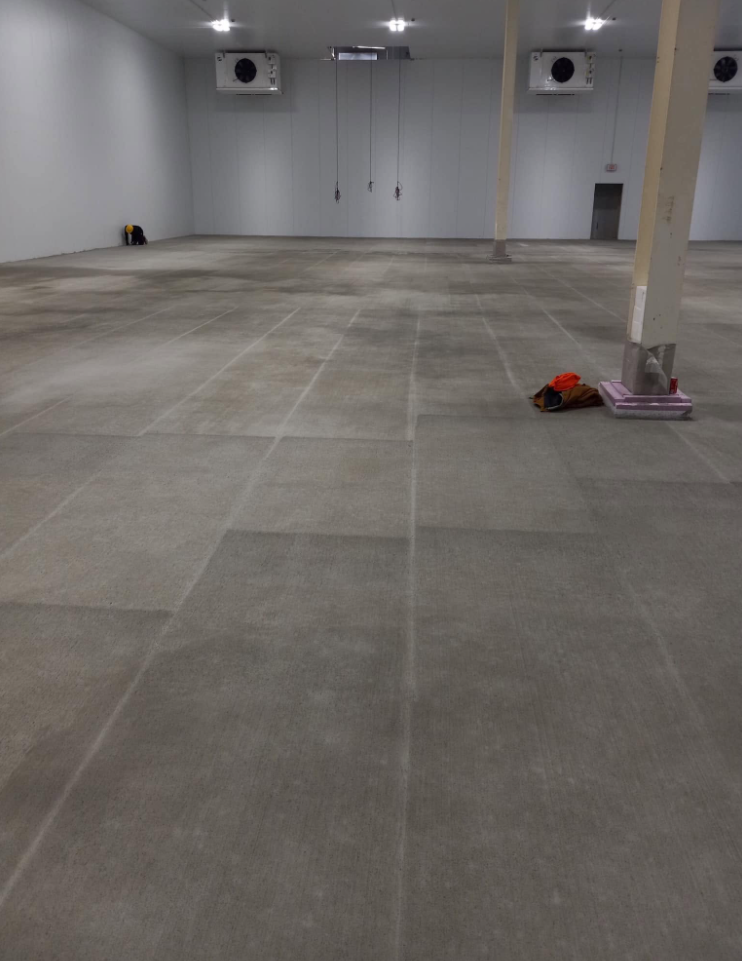 Finished commercial warehouse concrete floor slab